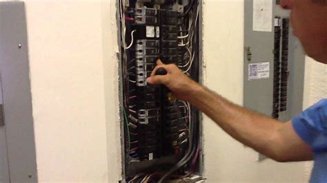 changing electrical breaker box|removing circuit breaker from panel.